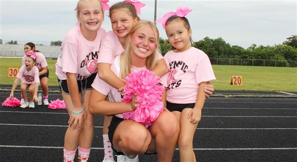 Little Lions Cheerleaders with OHHS cheerleader